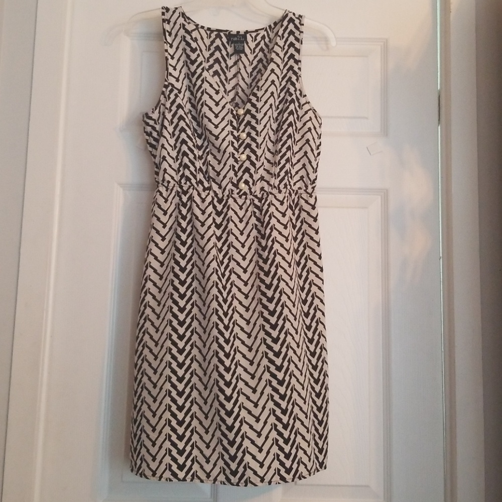 Cream and black tunic dress